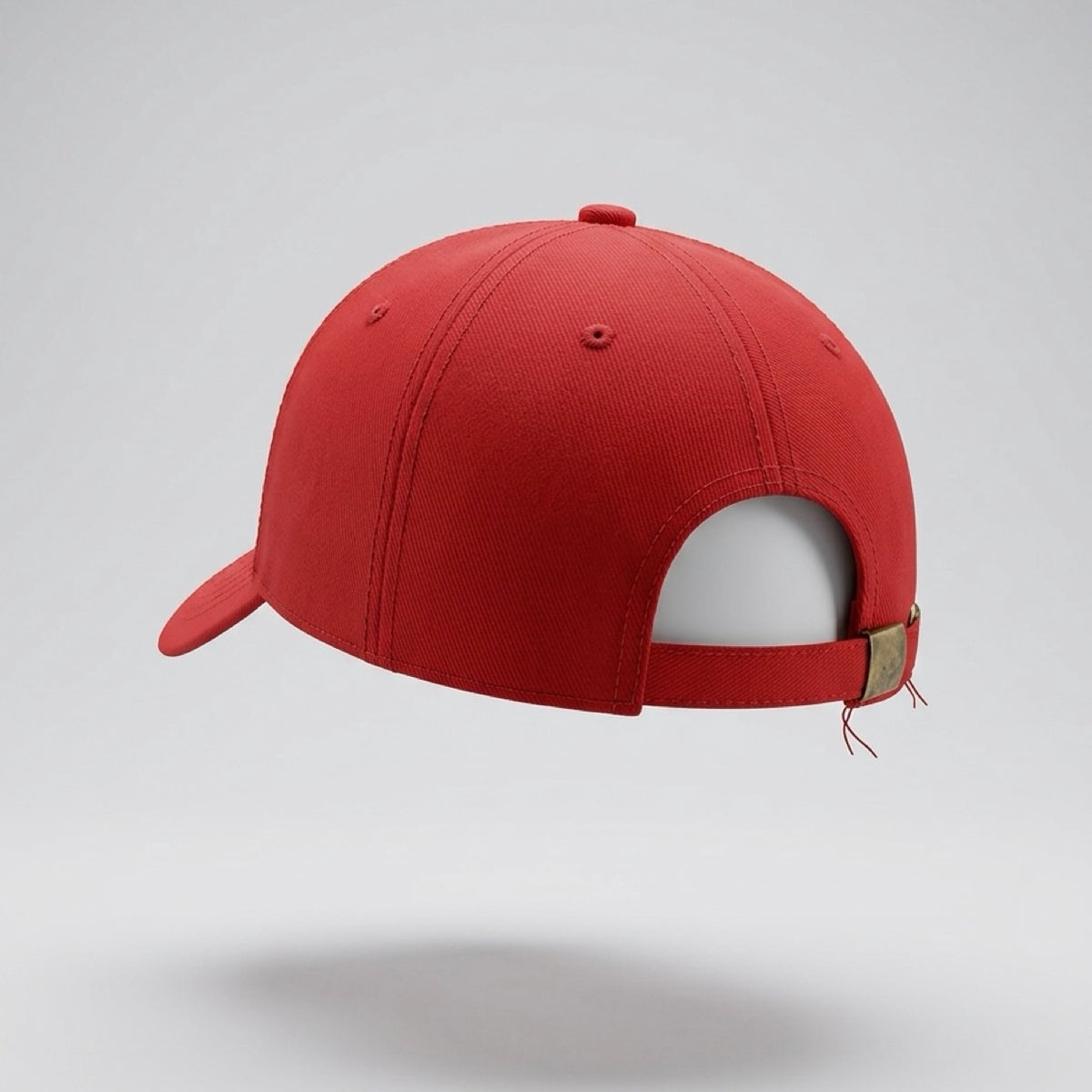 Red baseball cap on a light gray background