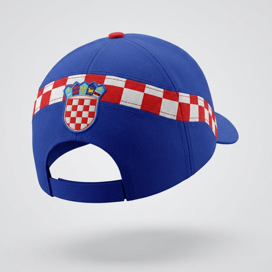Blue cap with a red, white, and blue checkered band featuring a crest on a light gray background