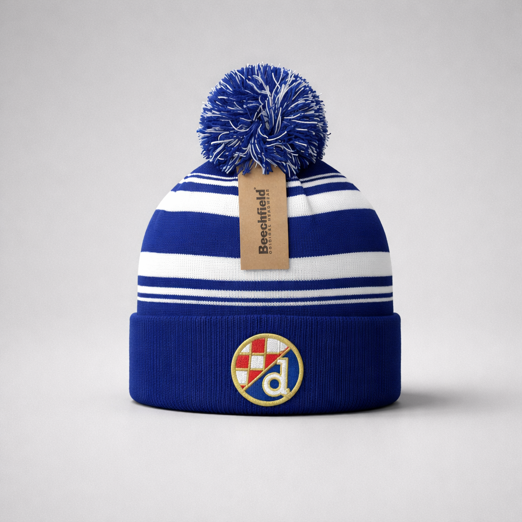 Beanie Dinamo Zagreb Pom Pom in Blue Blue and white striped beanie with pom-pom and brand tag on a light gray background