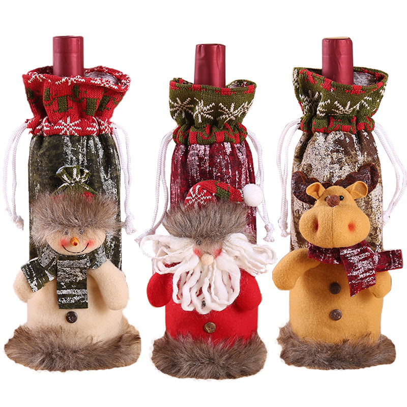 Christmas Bottle Cover – Santa, Snowman & Reindeer Three Christmas-themed wine bottle covers with decorative figures on a white background snc shopncro