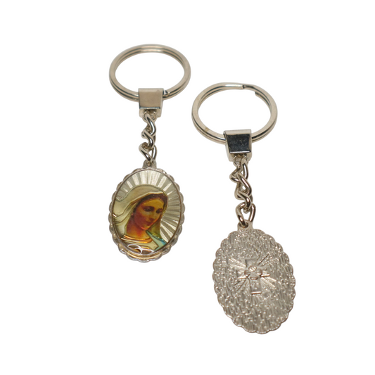 Keyring Virgin Mary with Engraved Cross (oval) Two keychains with religious and shell designs on a white background