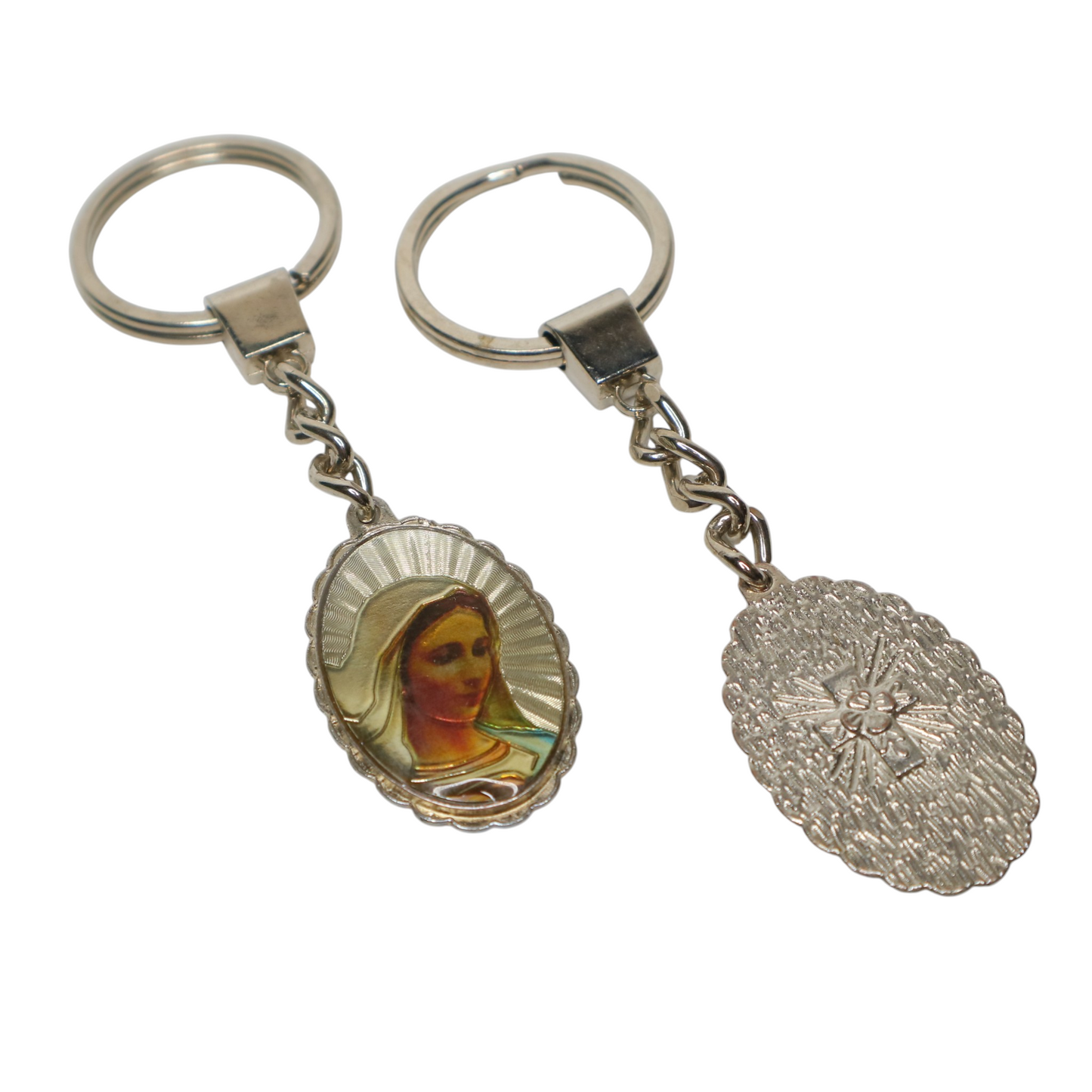Keyring Virgin Mary with Engraved Cross (oval) Keychain with religious design on a white background
