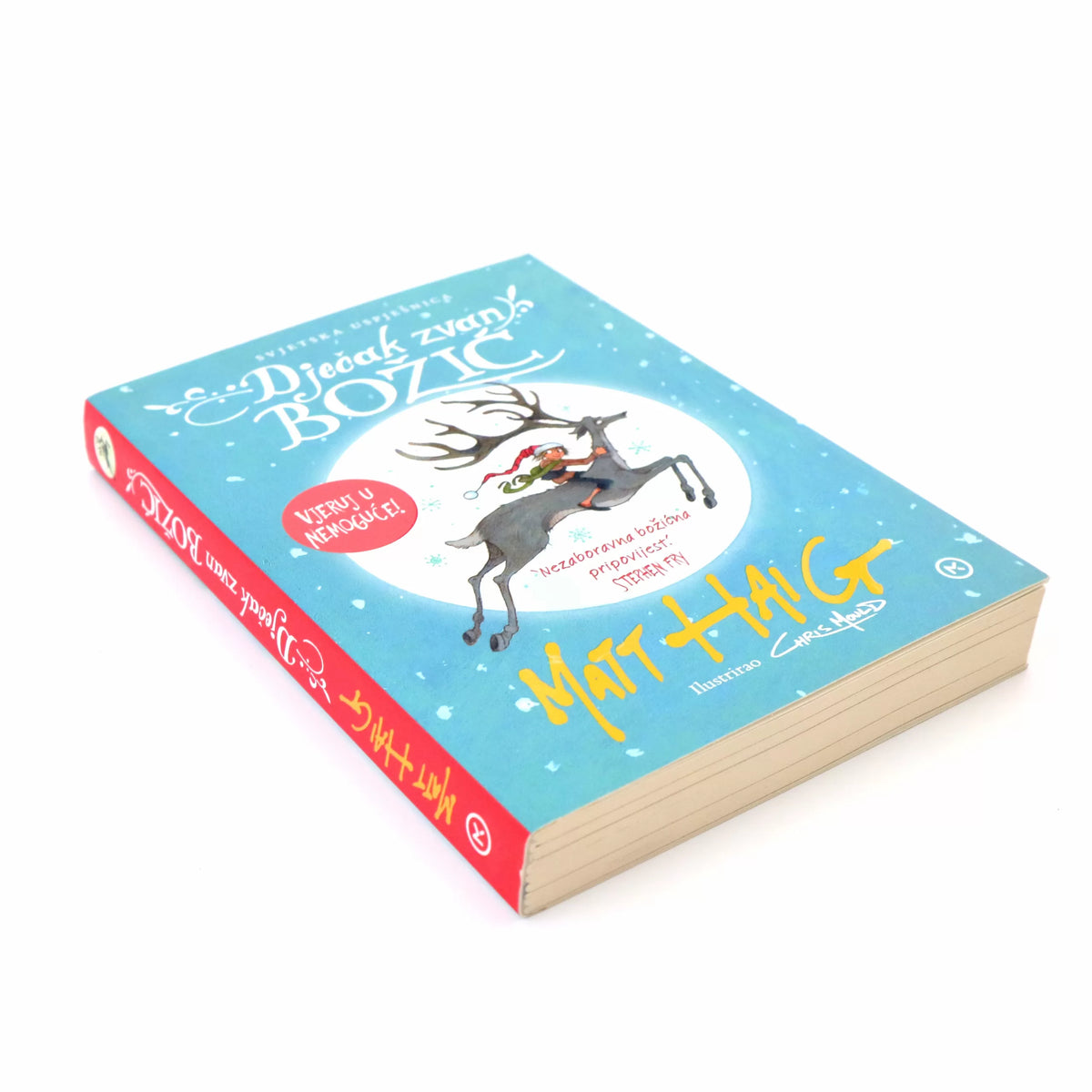 Matt Haig – Dječak Zvan Božić (A Boy Called Christmas) Book titled 'Bozic' with a reindeer illustration on a blue cover