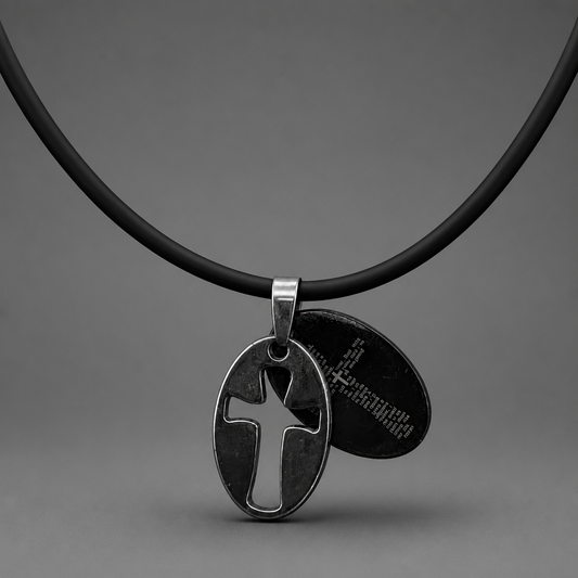 Oče Naš Necklace – Sliding Pendant Necklace with a black cord and silver pendant on a gray background