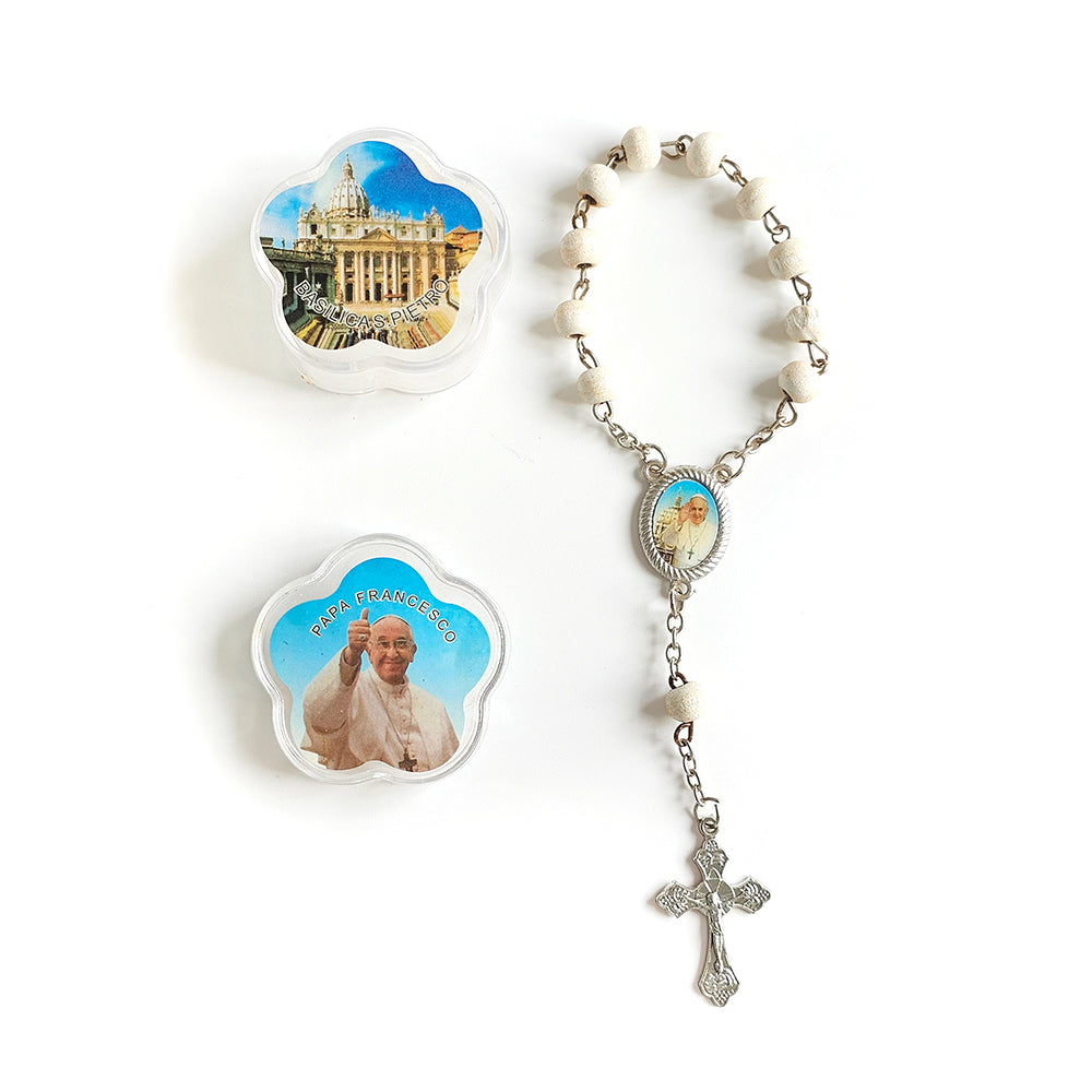 Pope Francis White Catholic Rosary with Vatican Souvenir Case Rosary with images of a building and a religious figure on a white background