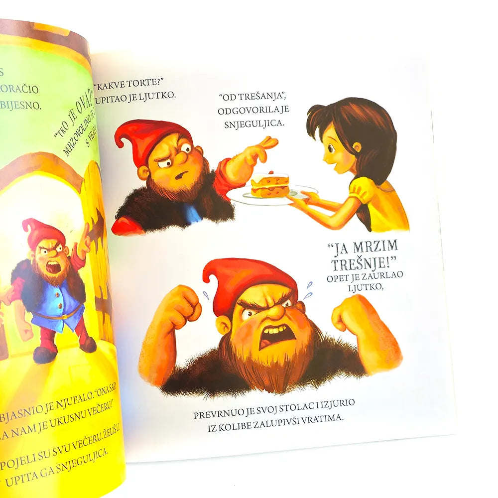 Snjeguljica i Ljutiti Patuljak Illustrated book or comic page with characters and text in a foreign language