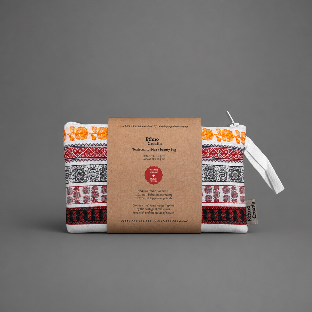 Toaletnu Torbica / Beauty Bag - Ethno Croatia Fabric pouch with traditional patterns and a brown label on a gray background