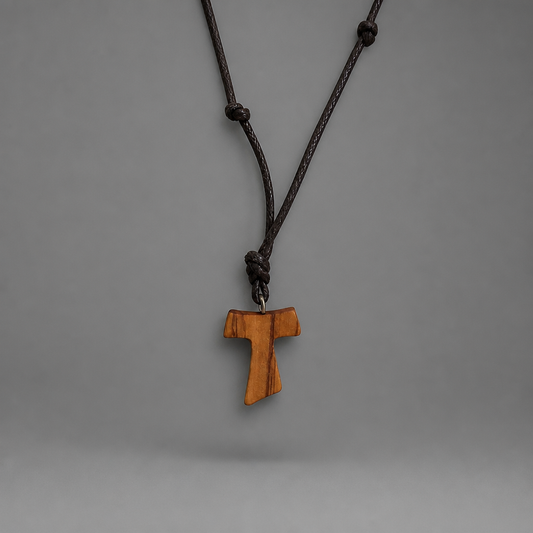 Traditional Međugorje Necklace (S) Wooden cross pendant on a brown cord against a gray background