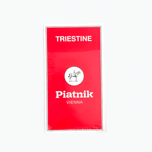 Triestine Piatnik Vienna Playing Cards Red card deck packaging with 'Triestine' and 'Piatnik Vienna' text on a white background