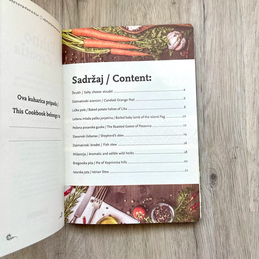 Dobri Stari Recepti – Kuharica (CRO + ENG) – Traditional Recipes & Personal Recipe Journal Open cookbook with a table of contents on a wooden surface