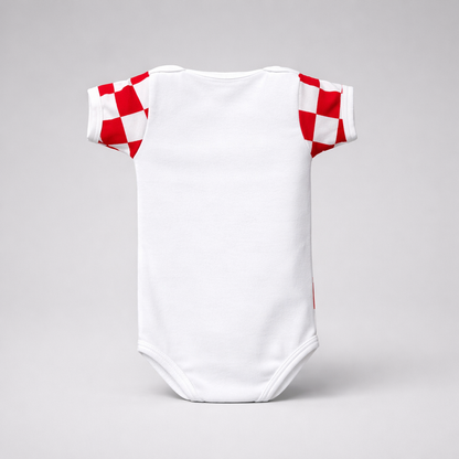 Baby Body Croatia White baby onesie with red and white checkered sleeves on a gray background