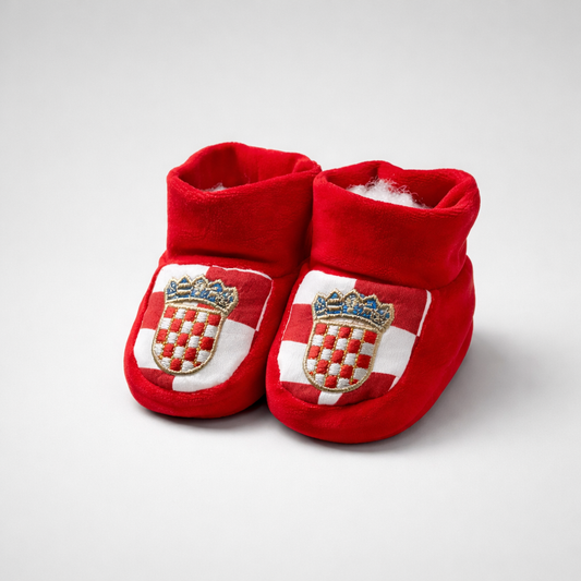 Baby Slippers Croatia in Red Red baby booties with a coat of arms design on a white background