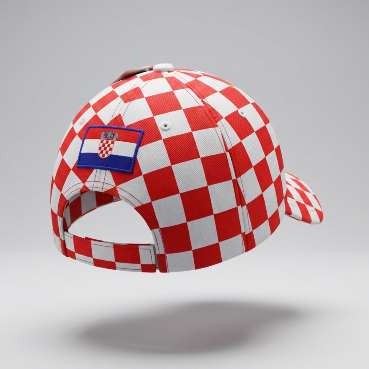 Red and white checkered cap with a Croatia flag patch on a gray background