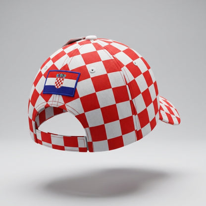 Red and white checkered cap with a Croatia flag patch on a gray background