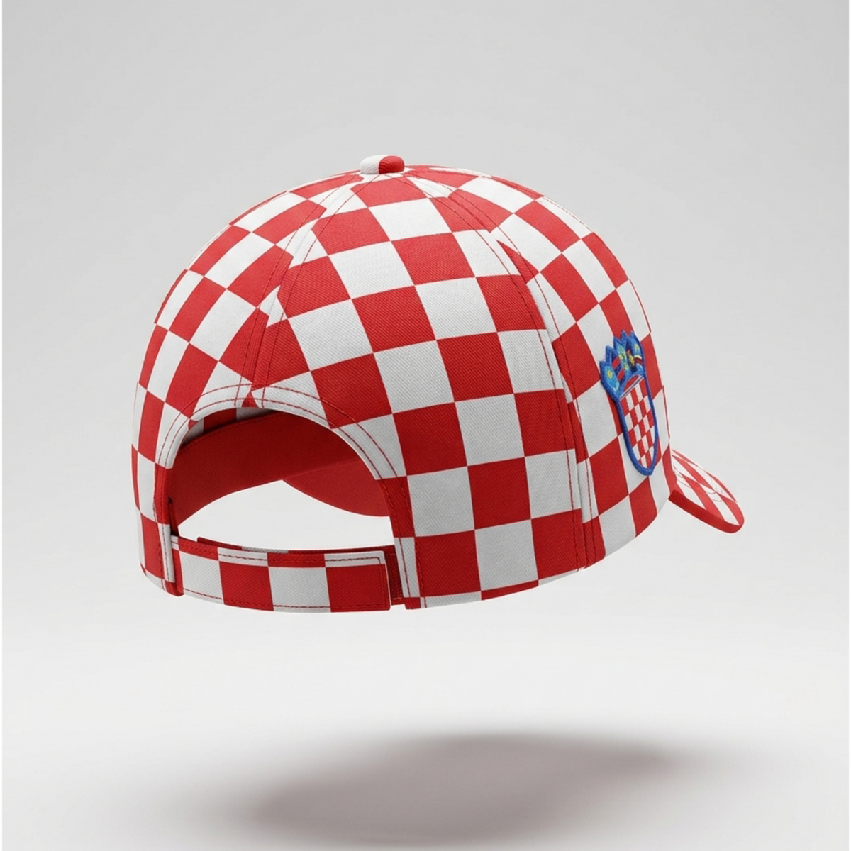 Red and white checkered cap with a logo on a light gray background