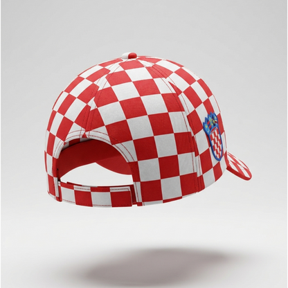 Red and white checkered cap with a logo on a light gray background