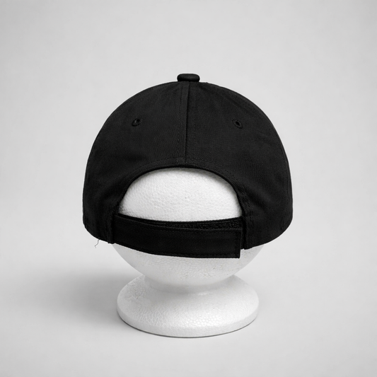 Baseball Cap HOS Za Dom Black cap on a white mannequin head against a light gray background