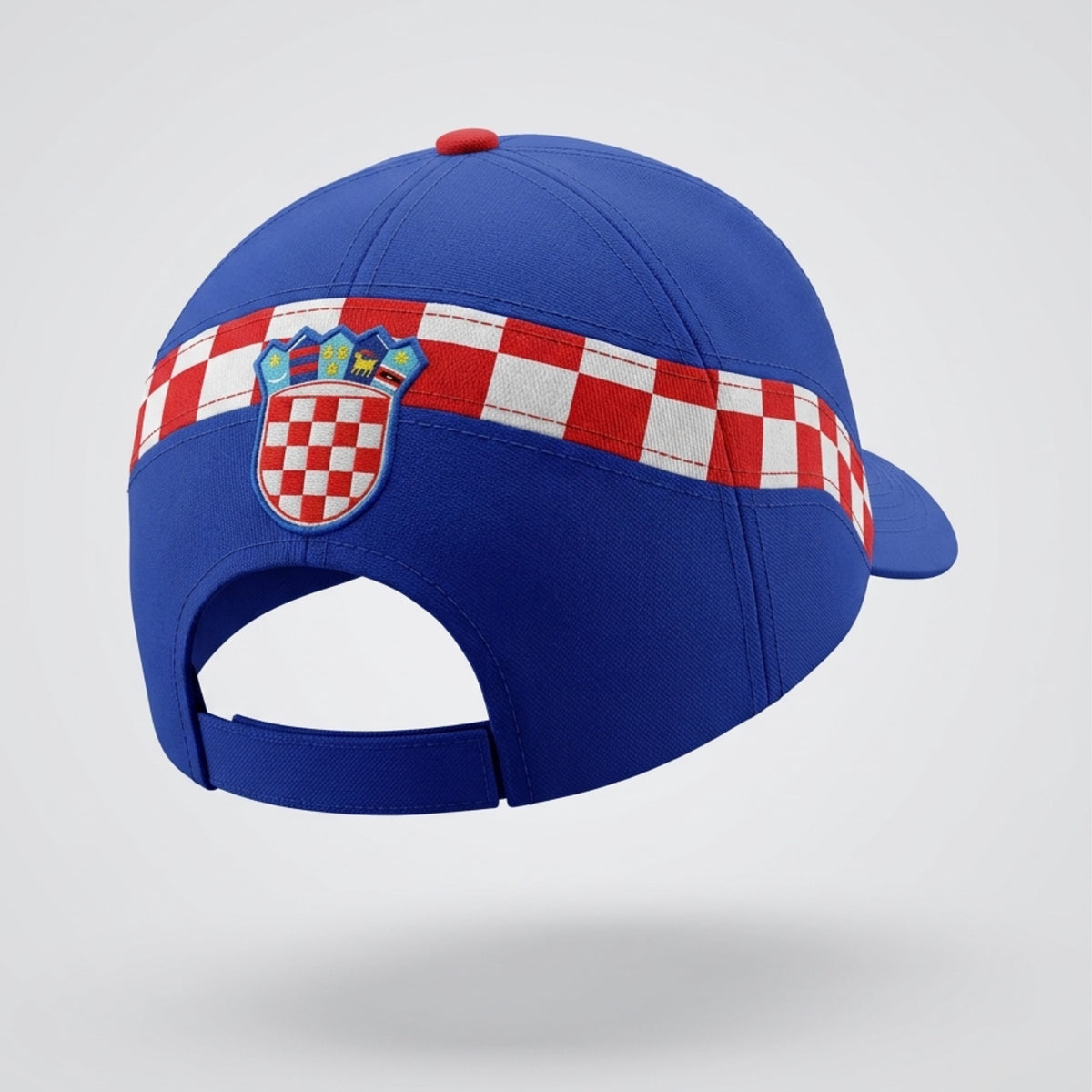 Blue cap with a red, white, and blue checkered band featuring a crest on a light gray background