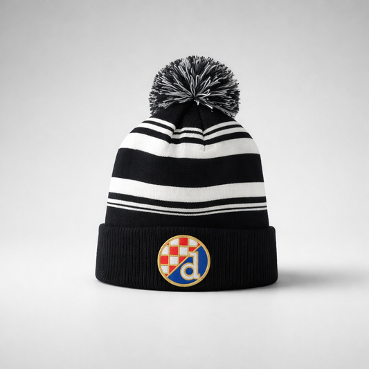 Beanie Dinamo Zagreb Pom Pom in Black Black and white striped beanie with a pom-pom on a light gray background