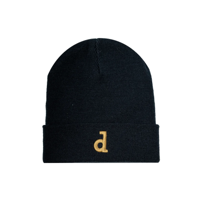 Beanie Dinamo Zagreb d in Black Black beanie with a gold 'd' on a white background