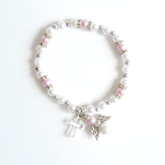 Bracelet Lilac & White Angel Cross Pearl and pink bead bracelet with a cross charm on a white background