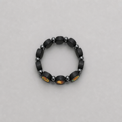 Bracelet Međugorje in Black Black beaded bracelet with colorful stones on a gray background