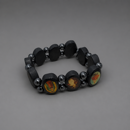 Bracelet Međugorje in Black Black beaded bracelet with silver accents on a gray background