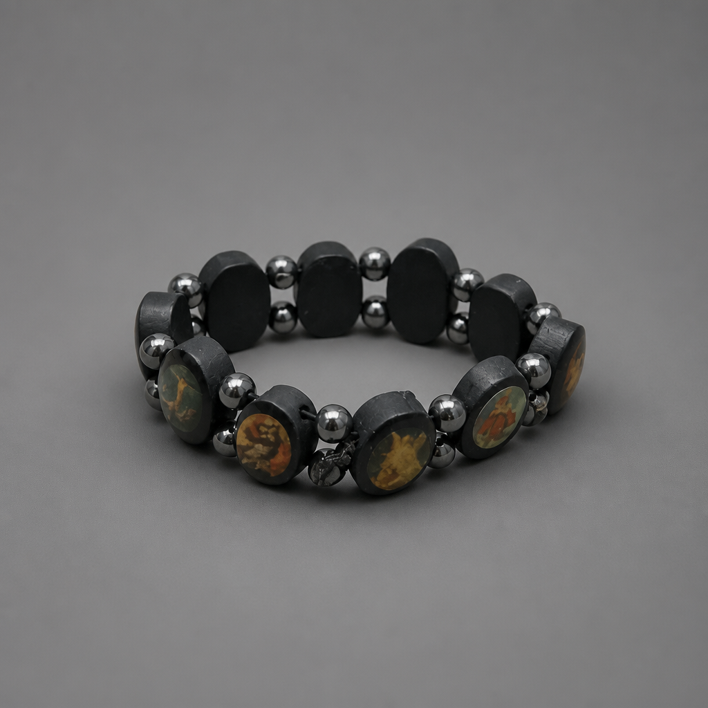 Bracelet Međugorje in Black Black beaded bracelet with silver accents on a gray background