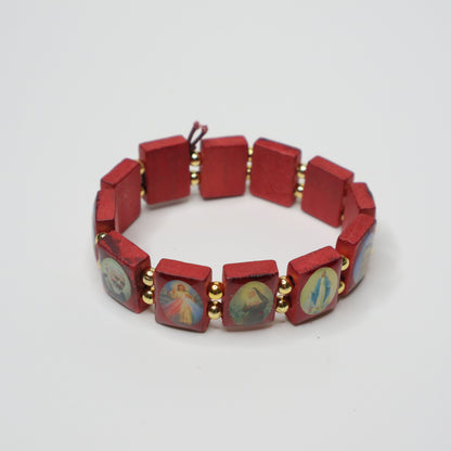 Bracelet Međugorje in Walnut Red bracelet with hexagonal beads featuring artistic designs on a white background