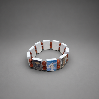 Bracelet Međugorje in White Bracelet with square beads on a gray background