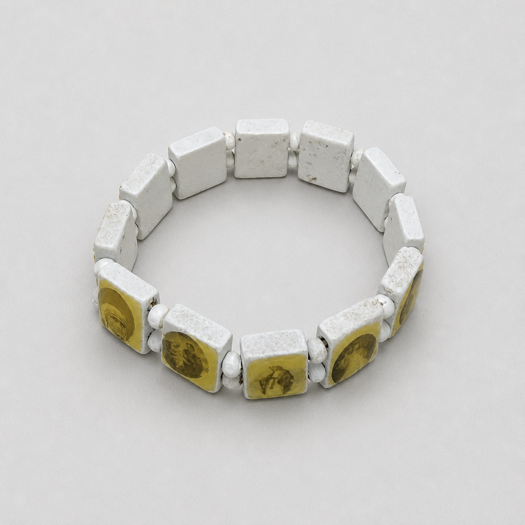 Bracelet Međugorje in White/Gold Bracelet with square ceramic beads on a light gray background
