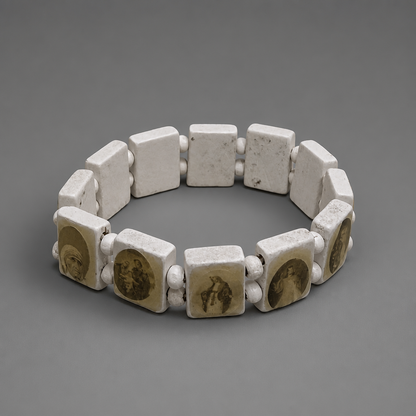 Bracelet Međugorje in White/Gold Bracelet made of stone-like material with embedded images on a gray background