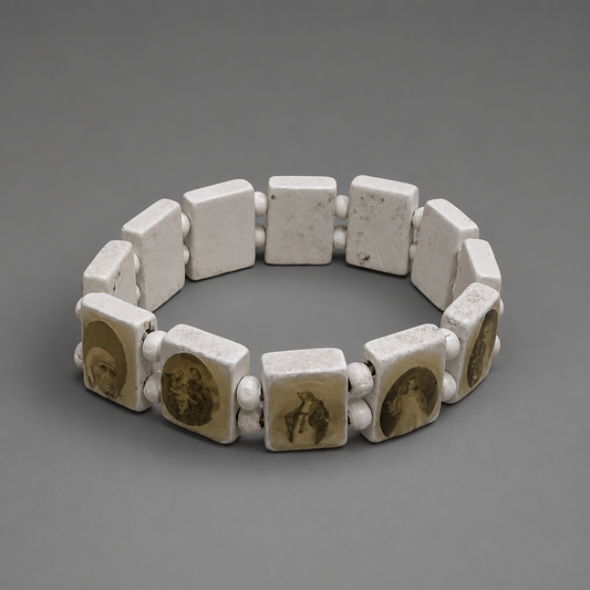 Bracelet Međugorje in White/Gold Bracelet made of stone-like material with embedded images on a gray background