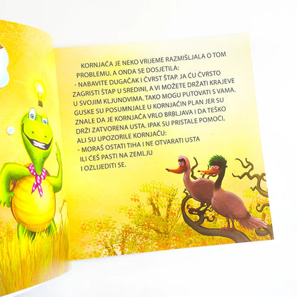 Brbljava Kornjača Open book with colorful illustrations and text on a yellow background