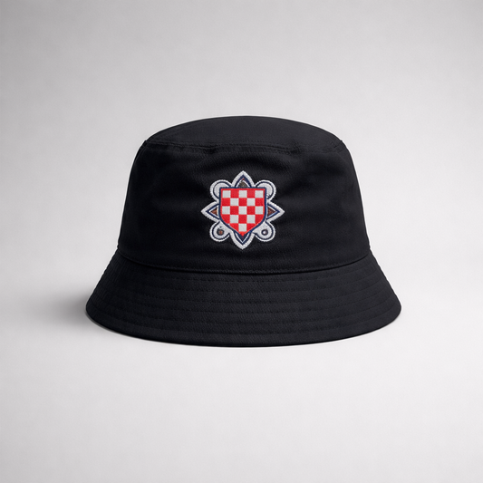 Bucket Hat Prvo Bijelo Polje Black bucket hat with a red and white emblem on a light gray background