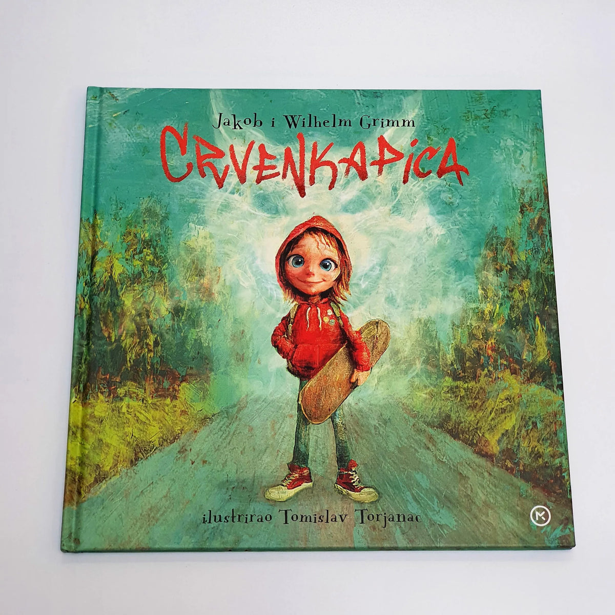 CRVENKAPICA (2020) Book cover of 'Cruvenkapica' with a character in a red hood on a path