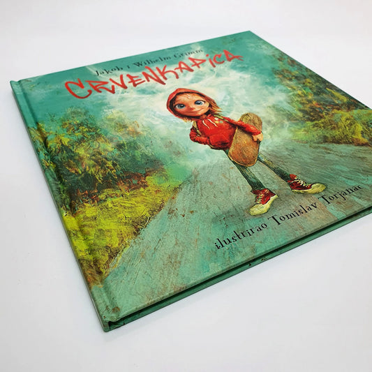 CRVENKAPICA (2020) Book titled 'Cavanadica' with a child in a red coat on the cover, set against a natural landscape.