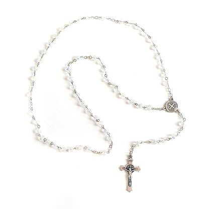 Clear Crystal Saint Benedict Rosary – Silver Crucifix & Medal Rosary necklace with beads and a cross pendant on a white background