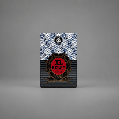 A single deck of playing cards standing upright on a neutral gray background. The card deck packaging features a blue and white plaid pattern on the top half, a central red oval label with black text reading 'XL RELAT MAYFAIR', and a dark gray striped bottom half with ornate gold detailing. Croatia BELOT Playing Cards - XL Size