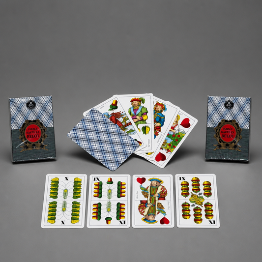 A game of cards deck set displayed on a neutral gray background, featuring the blue-and-white plaid deck box, two additional deck boxes, a fan of illustrated cards, and four face-up cards showing green and gold suit designs. Croatia BELOT Playing Cards