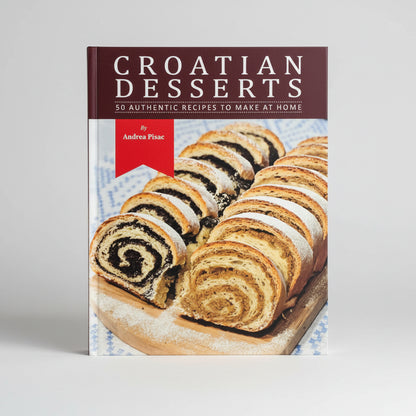 Croatian Desserts: Cookbook in English Language Book cover of 'Croatian Desserts' with a pastry on a white background