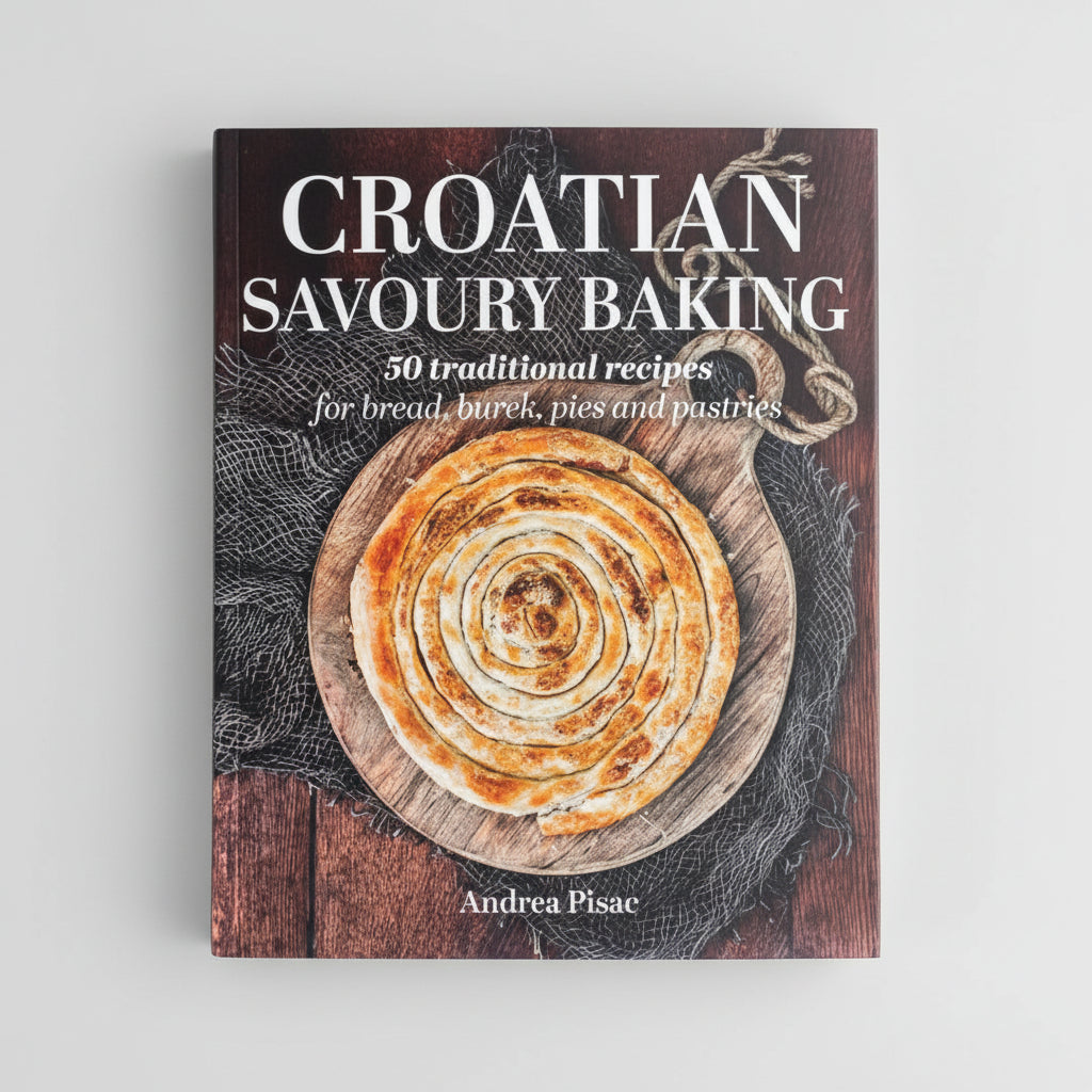 Croatian Savoury Baking: Cookbook in English Language Book cover of 'Croatian Savoury Baking' with a spiral bread on a wooden board.