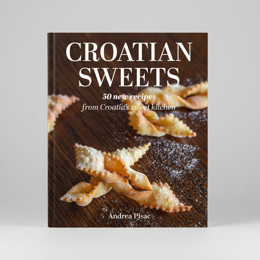 Croatian Sweets: Cookbook in English Language Book cover of 'Croatian Sweets' with pastry on a wooden surface