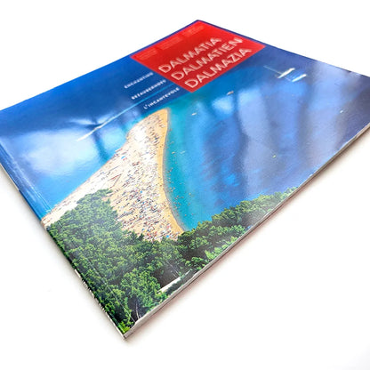 Dalmatia – Dalmatien – Dalmazia Book cover with a scenic view of a coastal area and the word 'Dalmatia' on a white background