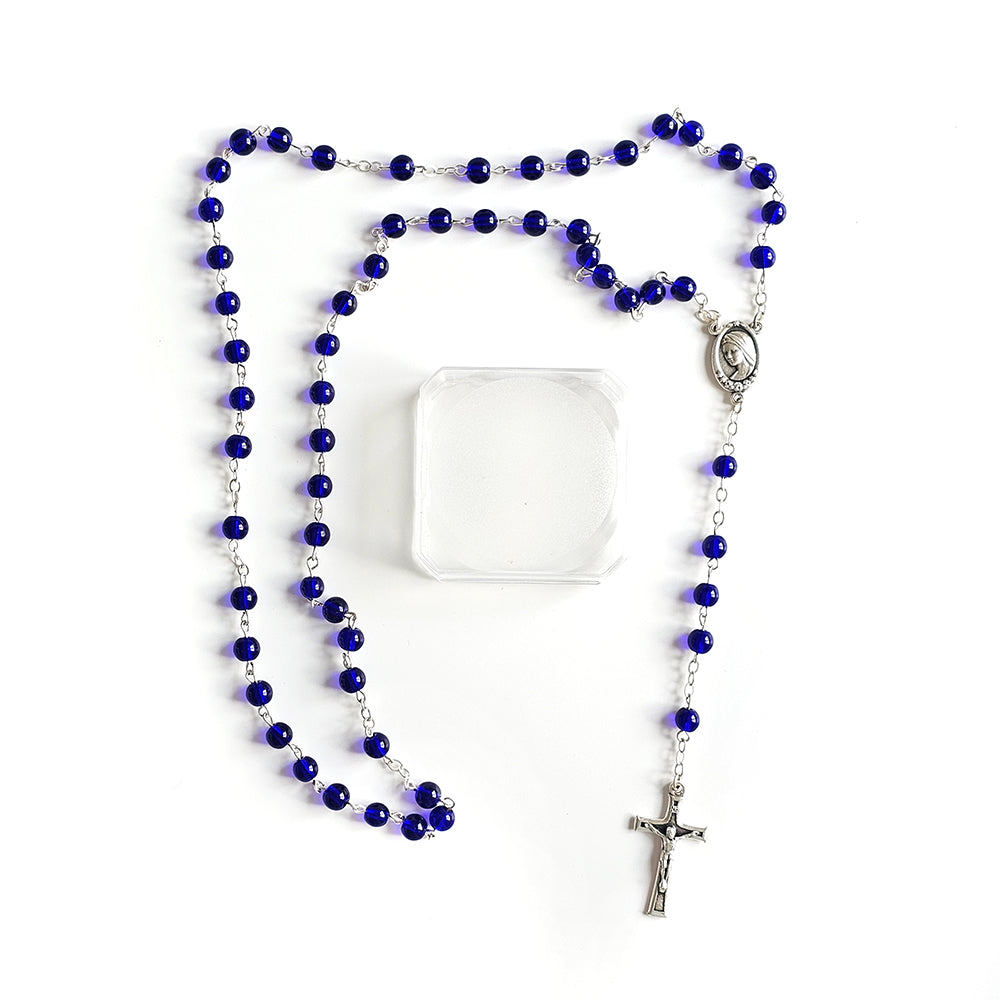 Dark Blue Catholic Rosary – Silver Crucifix & Marian Medal Blue rosary with a silver cross on a white snc shopncrobackground