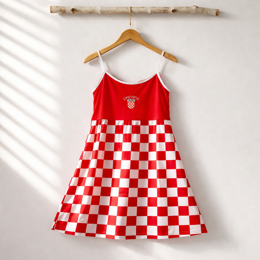 Dress Croatia Red and white checkered dress on a hanger against a light background