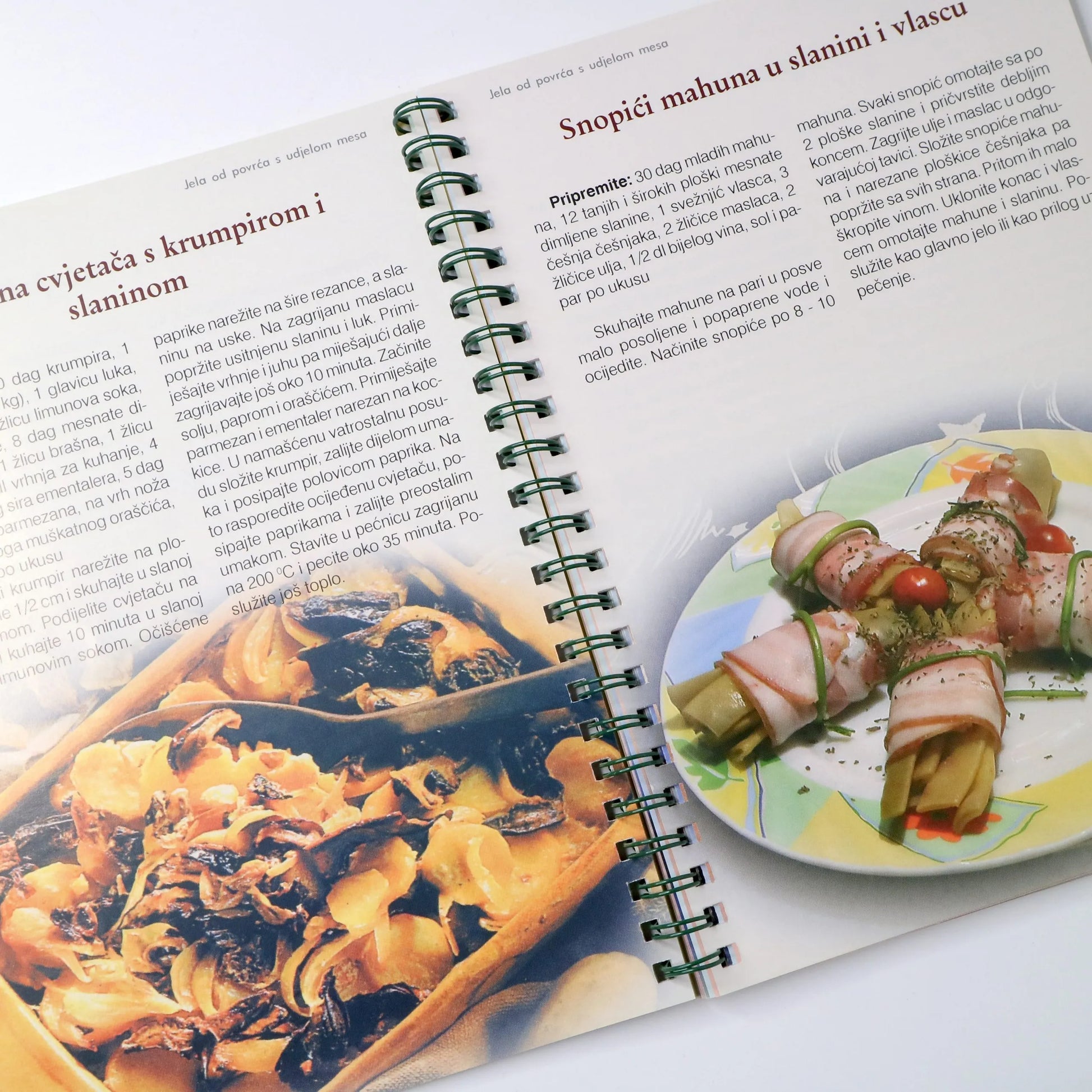 Ekološka Kuharica Open cookbook showing images of food and text on a white background