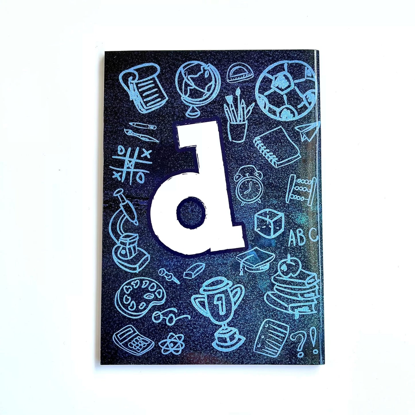 GNK Dinamo A5 Writing Book / Note Pad Notebook with blue illustrations and a large white letter 'd' on a black background