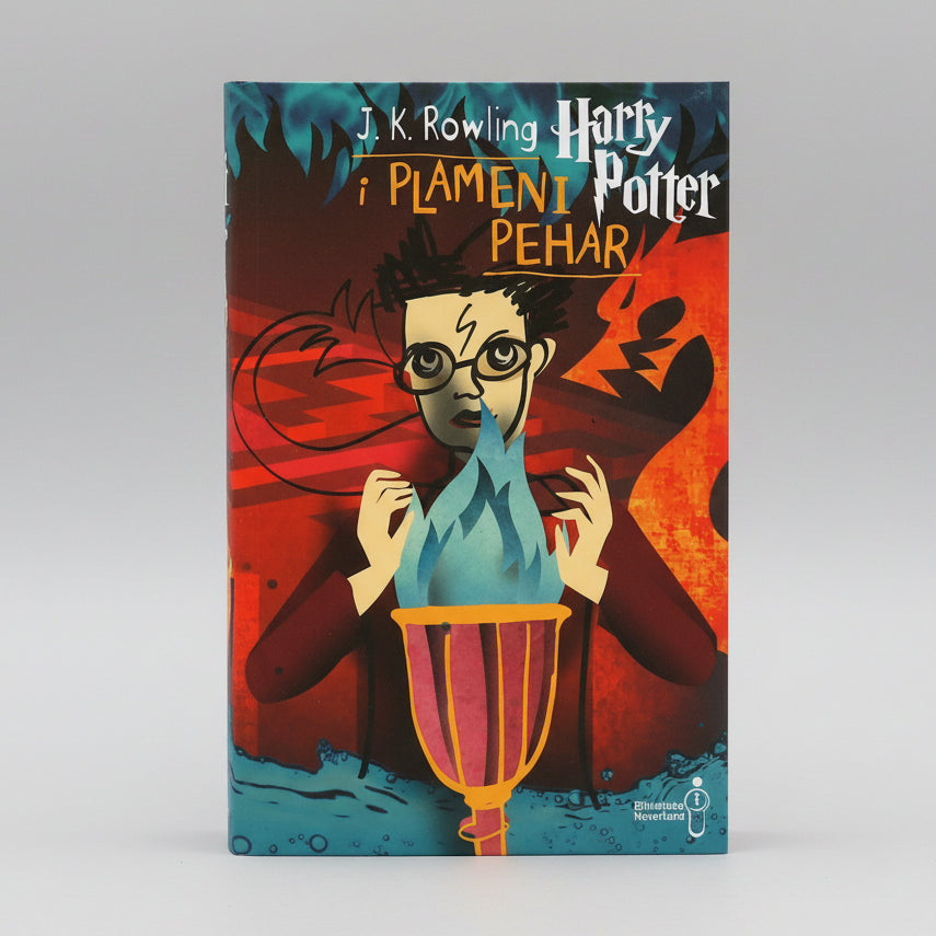 Book cover of 'Harry Potter' with a character holding a light blue flame against a red background