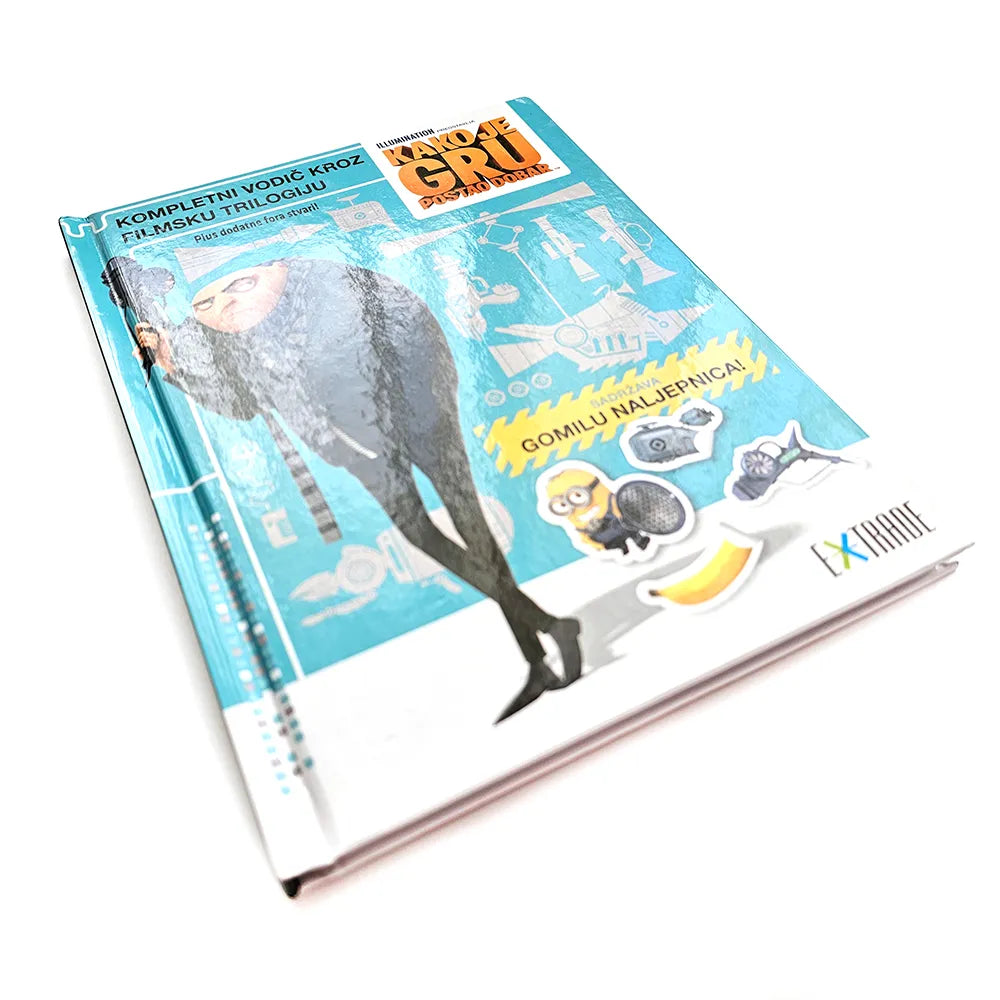 Kako je Gru Postao Dobar – Kompletni Vodič Kroz Filmsku Trilogiju Notebook with a whale illustration on the cover against a white background